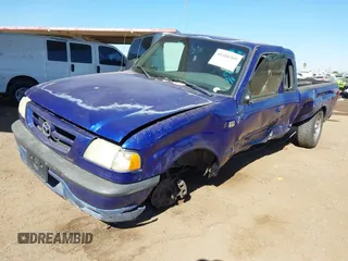 2004 Mazda B-Series 2WD Truck DS with VIN 4F4YR16U34TM00624, listed as a IAAI auction lot 41488309 with Not Provided miles. Bid and sale history available at carsss.com. Image 2.