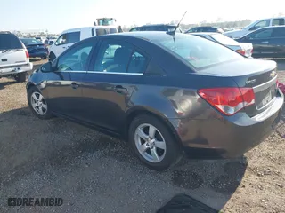 2014 Chevrolet Cruze 1LT with VIN 1G1PC5SB6E7199693, listed as a IAAI auction lot 42004060 with 97,231 mi miles. Bid and sale history available at carsss.com. Image 2.