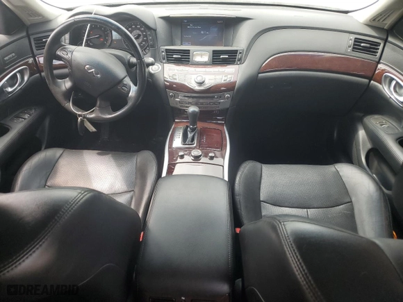 2015 Infiniti Q70L with VIN JN1BY1PR1FM830552, listed as a Copart auction lot 70282984 with 73,538 mi miles and Salvage Title. Bid and sale history available at carsss.com. Image 8.