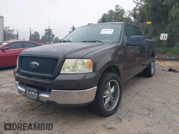2005 Ford F-150 XLT with VIN 1FTRW12W15KE64553, listed as a IAAI auction lot 42009373 with 106,454 mi miles. Bid and sale history available at carsss.com. Image 6.