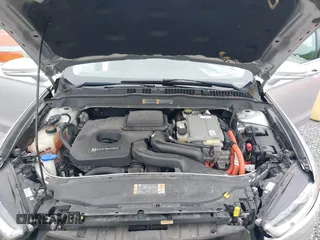 2013 Ford Fusion Titanium Hybrid with VIN 3FA6P0RU3DR281914, listed as a IAAI auction lot 42380838 with 166,956 mi miles and . Bid and sale history available at DreamBid. Image 10.