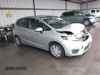 2016 Honda Fit LX with VIN JHMGK5H59GX017076, listed as a IAAI auction lot 41788349 with 83,295 mi miles. Bid and sale history available at carsss.com. Image 1.