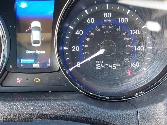 2013 Hyundai Sonata Hybrid Limited with VIN KMHEC4A40DA090333, listed as a IAAI auction lot 41479624 with 164,745 mi miles. Bid and sale history available at carsss.com. Image 16.