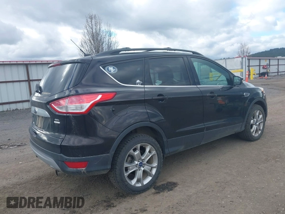 2013 Ford Escape SEL with VIN 1FMCU9H99DUA94169, listed as a IAAI auction lot 41937675 with 106,405 mi miles. Bid and sale history available at carsss.com. Image 4.