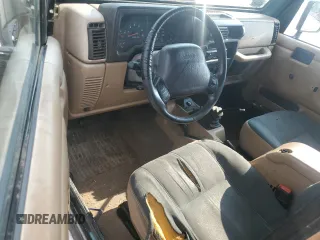 2002 Jeep Wrangler Sahara with VIN 1J4FA59S02P729015, listed as a Copart auction lot 63525745 with Not provided miles and Clean title. Bid and sale history available at DreamBid. Image 8.