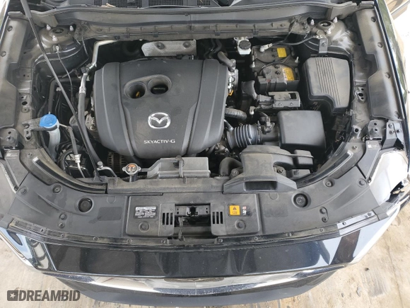 2020 Mazda CX-5 Grand Touring with VIN JM3KFADM1L0786963, listed as a Copart auction lot 52650035 with 68,606 mi miles and Salvage Title. Bid and sale history available at carsss.com. Image 13.