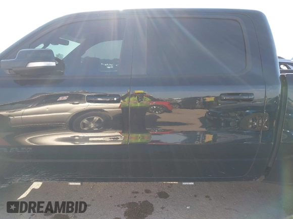 2021 Ram 1500 Big Horn with VIN 1C6SRFFT1MN520081, listed as a IAAI auction lot 42187257 with 186,011 mi miles and . Bid and sale history available at DreamBid. Image 14.