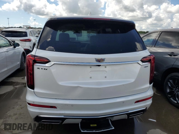 2024 Cadillac XT6 FWD Premium Luxury with VIN 1GYKPCRS6RZ735398, listed as a Copart auction lot 73658144 with 0 mi miles and Salvage Title. Bid and sale history available at carsss.com. Image 6.
