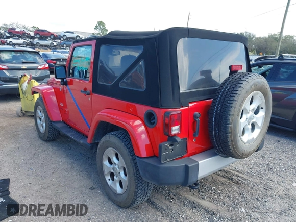2014 Jeep Wrangler Sahara with VIN 1C4AJWBG0EL109773, listed as a IAAI auction lot 41678412 with 12,264 mi miles and . Bid and sale history available at DreamBid. Image 3.