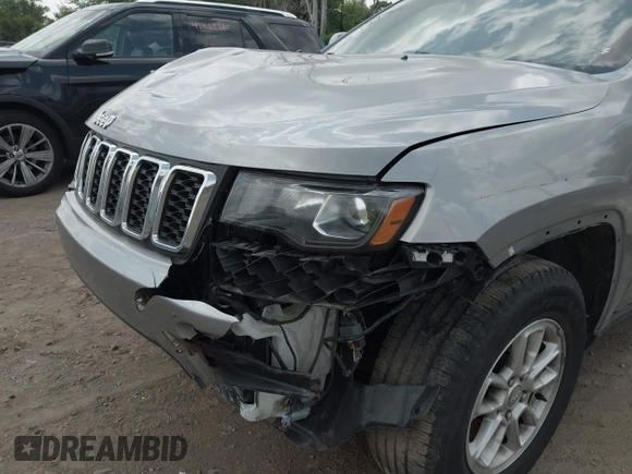 2020 Jeep Grand Cherokee Altitude with VIN 1C4RJFAG2LC241483, listed as a IAAI auction lot 42466089 with 68,638 mi miles and . Bid and sale history available at DreamBid. Image 6.
