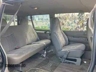 2000 Chevrolet Astro z VIN 1GNDM19W2YB102264, wystawiony jako Copart lot #54593295 z przebiegiem 244 323 mil mil oraz Tytuł czysty. Historia ofert i sprzedaży dostępna na DreamBid. Obrazek 6.