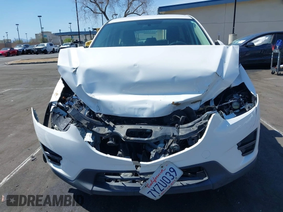 2016 Mazda CX-5 Sport with VIN JM3KE2BY9G0825285, listed as a IAAI auction lot 41841833 with 96,915 mi miles. Bid and sale history available at carsss.com. Image 12.
