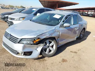 2013 Volkswagen Passat SE w/Sunroof & Nav with VIN 1VWBP7A35DC036516, listed as a IAAI auction lot 41545305 with 182,266 mi miles. Bid and sale history available at carsss.com. Image 2.