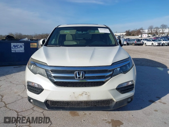 2016 Honda Pilot EX-L with VIN 5FNYF5H5XGB016152, listed as a IAAI auction lot 41820023 with 210,474 mi miles and . Bid and sale history available at DreamBid. Image 13.