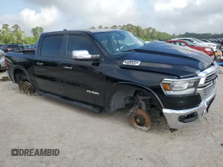 2019 Ram 1500 Laramie with VIN 1C6SRFJT4KN521147, listed as a Copart auction lot 54108615 with 152,888 mi miles and Salvage title. Bid and sale history available at DreamBid. Image 4.
