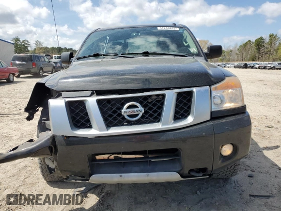 2015 Nissan Titan Pro-4X with VIN 1N6BA0EC1FN507491, listed as a Copart auction lot 51240915 with 165,510 mi miles and Salvage title. Bid and sale history available at DreamBid. Image 5.