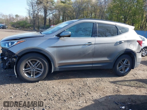2018 Hyundai Santa Fe 2.4L z VIN 5NMZUDLB7JH077241, wystawiony jako IAAI lot #42135854 z przebiegiem 59 819 mil mil oraz . Historia ofert i sprzedaży dostępna na DreamBid. Obrazek 14.