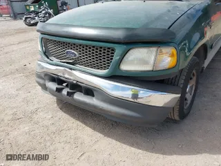 2000 Ford F-150 Work Series with VIN 1FTRX17W8YKA87939, listed as a IAAI auction lot 41882284 with 1 mi miles. Bid and sale history available at carsss.com. Image 12.