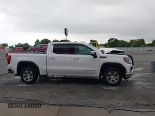 2021 GMC Sierra 1500 SLT z VIN 3GTU9DED4MG261384, wystawiony jako IAAI lot #42161232 z przebiegiem 36 685 mil mil oraz . Historia ofert i sprzedaży dostępna na DreamBid. Obrazek 13.