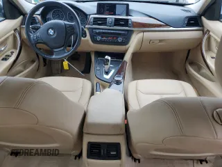 2014 BMW 3 Series 320i xDrive with VIN WBA3C3C51EF983592, listed as a Copart auction lot 60608765 with 195,061 mi miles and Salvage title. Bid and sale history available at DreamBid. Image 8.