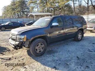 2011 Chevrolet Suburban LS with VIN 1GNSCHE01BR155461, listed as a Copart auction lot 89156045 with 214,430 mi miles and Salvage Title. Bid and sale history available at carsss.com. Image 1.