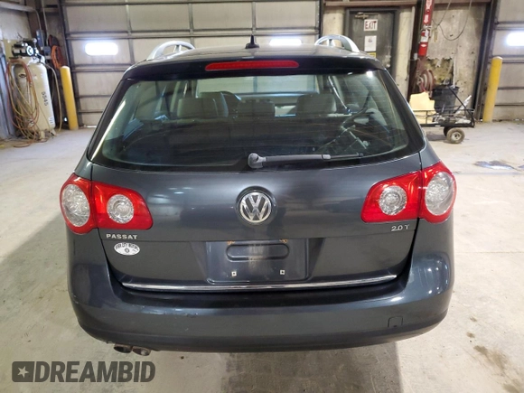 2009 Volkswagen Passat z VIN WVWXK73C39E051595, wystawiony jako Copart lot #76318454 z przebiegiem 155 892 mil mil oraz Nie do naprawy • Non repairable. Historia ofert i sprzedaży dostępna na DreamBid. Obrazek 6.