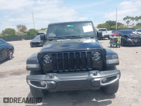 2022 Jeep Gladiator Willys Sport z VIN 1C6HJTAG7NL161701, wystawiony jako IAAI lot #42097144 z przebiegiem 32 989 mil mil oraz . Historia ofert i sprzedaży dostępna na DreamBid. Obrazek 13.