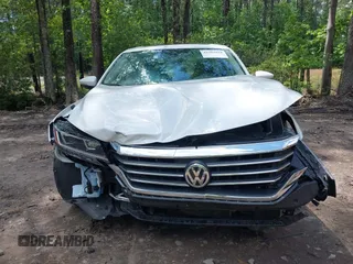 2021 Volkswagen Passat SE with VIN 1VWSA7A38MC014396, listed as a IAAI auction lot 42201818 with 62,193 mi miles and . Bid and sale history available at DreamBid. Image 6.
