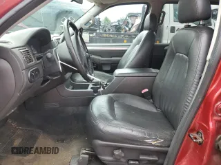 2004 Mercury Mountaineer Convenience with VIN 4M2ZU86KX4UJ06323, listed as a Copart auction lot 61662835 with 186,014 mi miles and Salvage title. Bid and sale history available at DreamBid. Image 7.