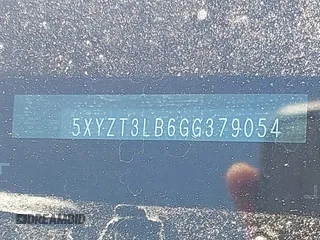 2016 Hyundai Santa Fe z VIN 5XYZT3LB6GG379054, wystawiony jako IAAI lot #42406174 z przebiegiem 182 073 mil mil oraz . Historia ofert i sprzedaży dostępna na DreamBid. Obrazek 9.