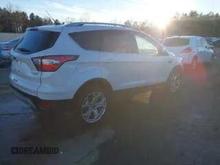 2017 Ford Escape Titanium with VIN 1FMCU0J98HUA75690, listed as a IAAI auction lot 41358534 with 90,376 mi miles. Bid and sale history available at carsss.com. Image 4.