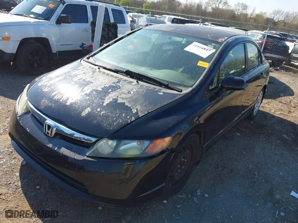 2006 Honda Civic Sdn LX with VIN 1HGFA16586L139771, listed as a IAAI auction lot 41894847 with 230,878 mi miles. Bid and sale history available at carsss.com. Image 2.