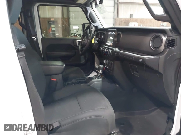 2023 Jeep Wrangler Sport S with VIN 1C4HJXDN2PW632584, listed as a IAAI auction lot 41965191 with 20,288 mi miles and . Bid and sale history available at DreamBid. Image 5.