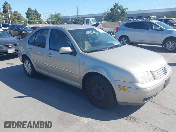 2004 Volkswagen Jetta GL z VIN 3VWRA69M64M039222, wystawiony jako IAAI lot #42262445 z przebiegiem 100 200 mil mil oraz . Historia ofert i sprzedaży dostępna na DreamBid. Obrazek 1.