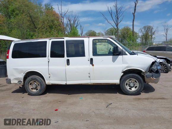 2005 Chevrolet Express Passenger with VIN 1GAHG35U051181753, listed as a IAAI auction lot 42074333 with 335,090 mi miles and . Bid and sale history available at DreamBid. Image 13.
