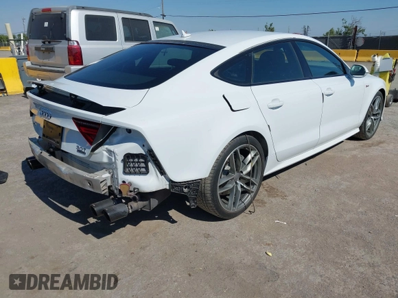 2016 Audi A7 Prestige with VIN WAU2GAFC9GN062082, listed as a IAAI auction lot 42711776 with 65,768 mi miles and . Bid and sale history available at DreamBid. Image 4.