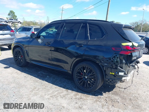 2025 BMW X5 sDrive40i with VIN 5UX13EU01S9W88784, listed as a IAAI auction lot 41631766 with 12,805 mi miles. Bid and sale history available at carsss.com. Image 3.