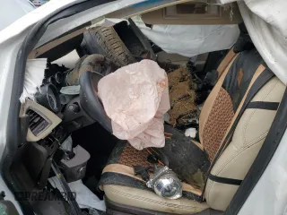 2014 Buick Verano with VIN 1G4PP5SK9E4180404, listed as a Copart auction lot 61438965 with Not provided miles and Salvage title. Bid and sale history available at DreamBid. Image 7.