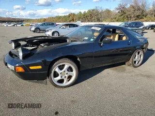 1989 Porsche 928 z VIN WP0JB0923KS861070, wystawiony jako Copart lot #76032254 z przebiegiem Nie podano mil oraz Szkody całkowita. Historia ofert i sprzedaży dostępna na DreamBid. Obrazek 1.