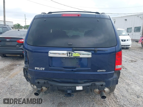 2015 Honda Pilot EX-L with VIN 5FNYF4H56FB040909, listed as a IAAI auction lot 42028609 with 267,375 mi miles and . Bid and sale history available at carsss.com. Image 16.