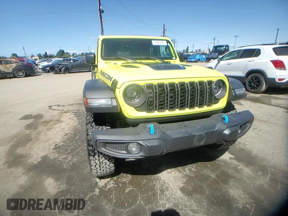 2024 Jeep Wrangler Rubicon z VIN 1C4RJXR64RW193946, wystawiony jako Copart lot #51693105 z przebiegiem 4 863 mil mil oraz Szkoda całkowita • Salvage title. Historia ofert i sprzedaży dostępna na DreamBid. Obrazek 11.