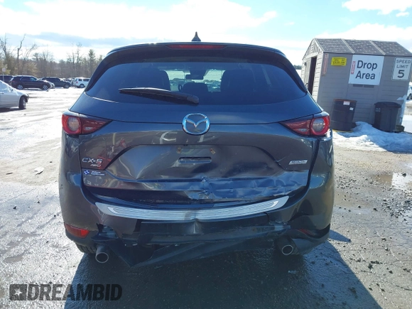 2017 Mazda CX-5 Touring with VIN JM3KFBCL3H0214881, listed as a IAAI auction lot 41694560 with 64,609 mi miles. Bid and sale history available at carsss.com. Image 16.