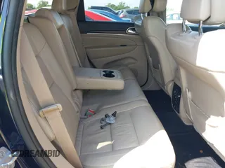 2014 Jeep Grand Cherokee Limited with VIN 1C4RJEBG9EC201512, listed as a IAAI auction lot 42091266 with 129,897 mi miles and . Bid and sale history available at DreamBid. Image 8.