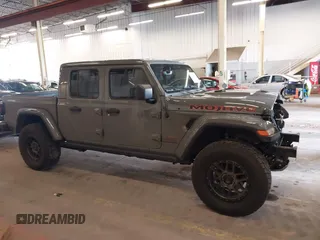 2021 Jeep Gladiator Mojave with VIN 1C6JJTEG1ML596109, listed as a IAAI auction lot 41783913 with 71,112 mi miles and . Bid and sale history available at DreamBid. Image 13.