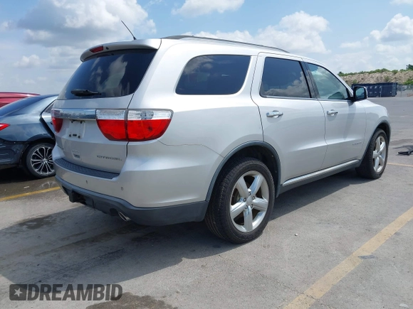 2013 Dodge Durango Citadel with VIN 1C4RDHEG0DC571833, listed as a IAAI auction lot 42736033 with 110,808 mi miles and . Bid and sale history available at DreamBid. Image 4.