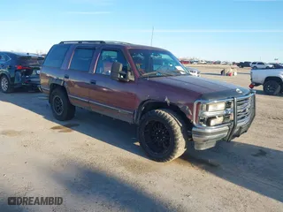 1996 Chevrolet Tahoe with VIN 1GNEK13R9TJ408499, listed as a IAAI auction lot 41308726 with 118,336 mi miles. Bid and sale history available at carsss.com. Image 1.