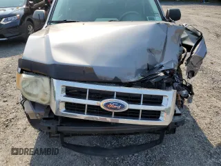 2008 Ford Escape XLS with VIN 1FMCU02Z18KE11979, listed as a Copart auction lot 60212165 with 239,177 mi miles and Salvage title. Bid and sale history available at DreamBid. Image 12.