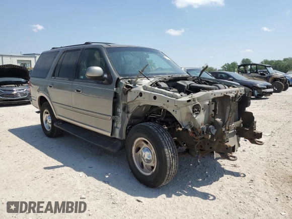 1999 Ford Expedition XLT z VIN 1FMPU18L0XLC03675, wystawiony jako Copart lot #56721435 z przebiegiem 111 652 mil mil oraz Szkoda całkowita • Salvage title. Historia ofert i sprzedaży dostępna na DreamBid. Obrazek 4.