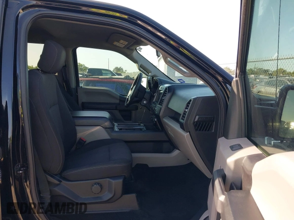 2018 Ford F-150 XL with VIN 1FTEW1C58JKC02382, listed as a IAAI auction lot 42010568 with 124,757 mi miles and . Bid and sale history available at DreamBid. Image 5.