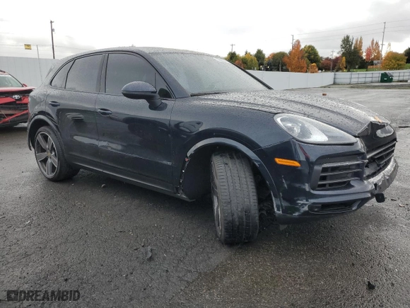 2023 Porsche Cayenne with VIN WP1AA2AY8PDA07877, listed as a Copart auction lot 77680334 with 22,398 mi miles and Salvage Title. Bid and sale history available at carsss.com. Image 4.